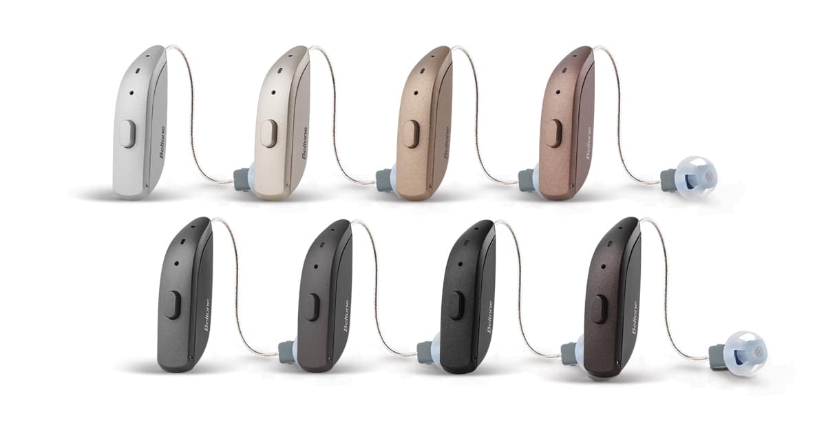 An image shows 8 different Beltone Achieve hearing aid systems, each a different color. The colors range from white, silver, a neutral skin-tone color, to darker gray and black.